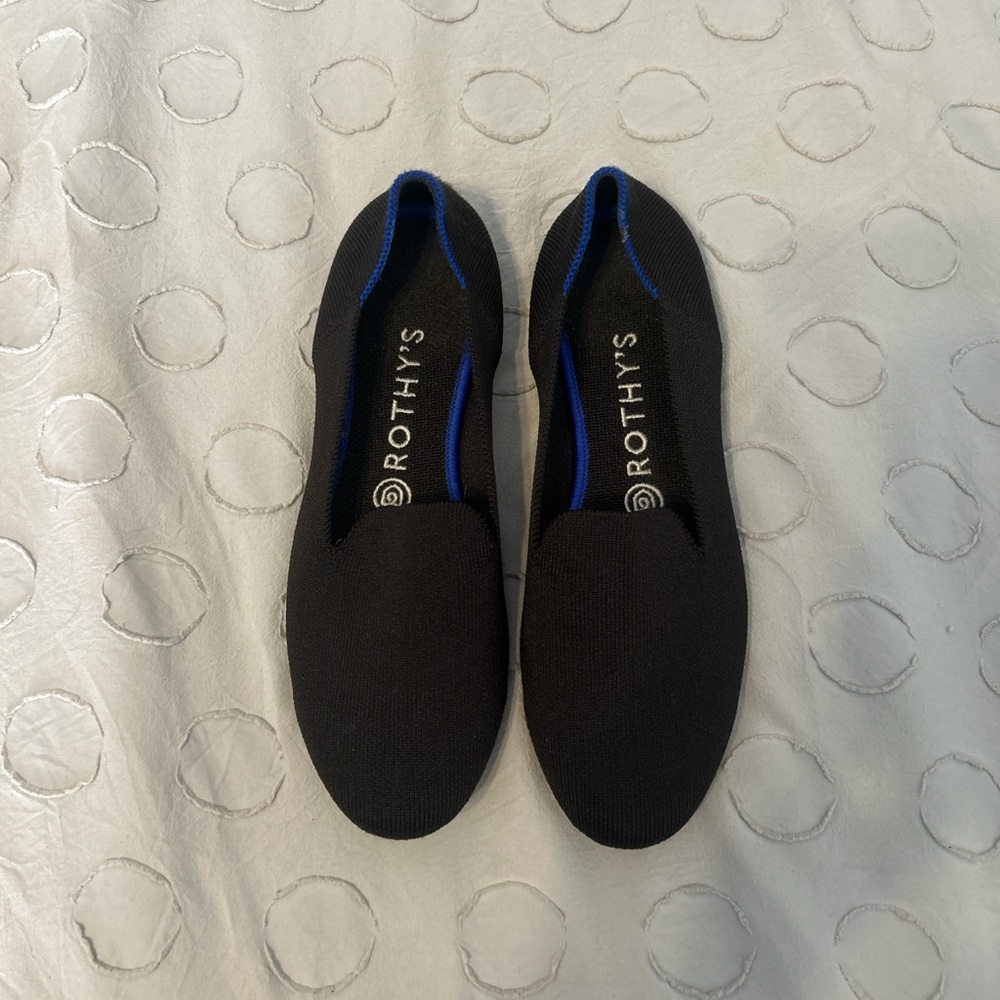 Rothy's Black Slip-Ons with Blue Trim